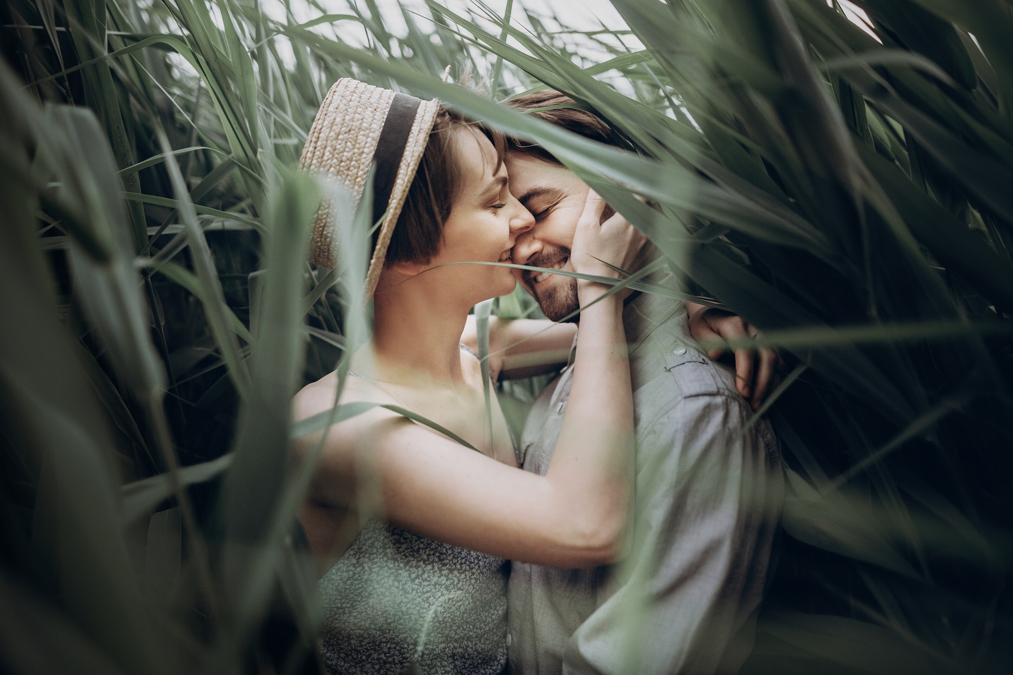 happy-hipster-couple-embracing-at-lake-in-cane-1.jpg